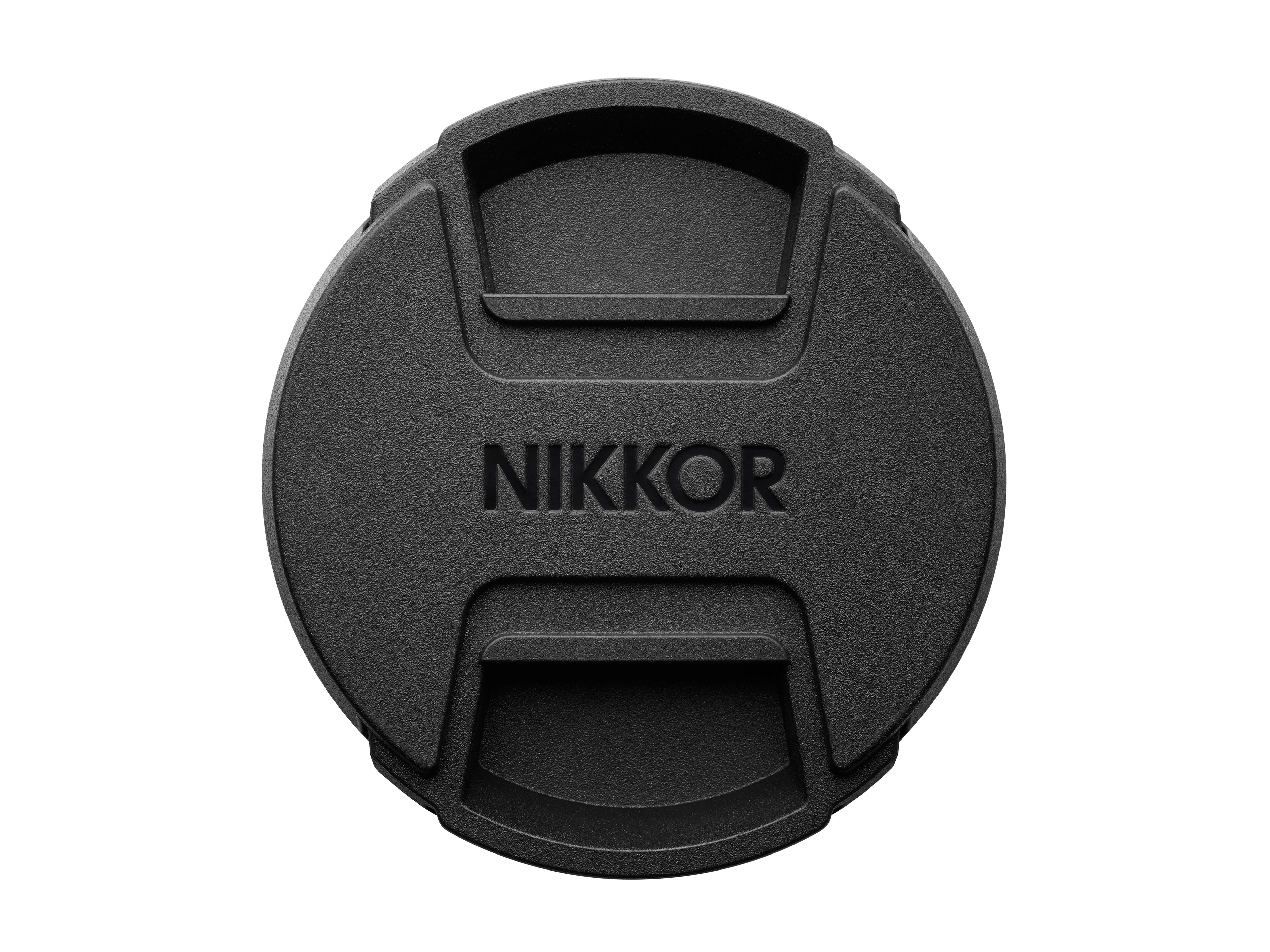 Eine schwarze Objektivkappe mit dem Wort NIKKOR darauf.