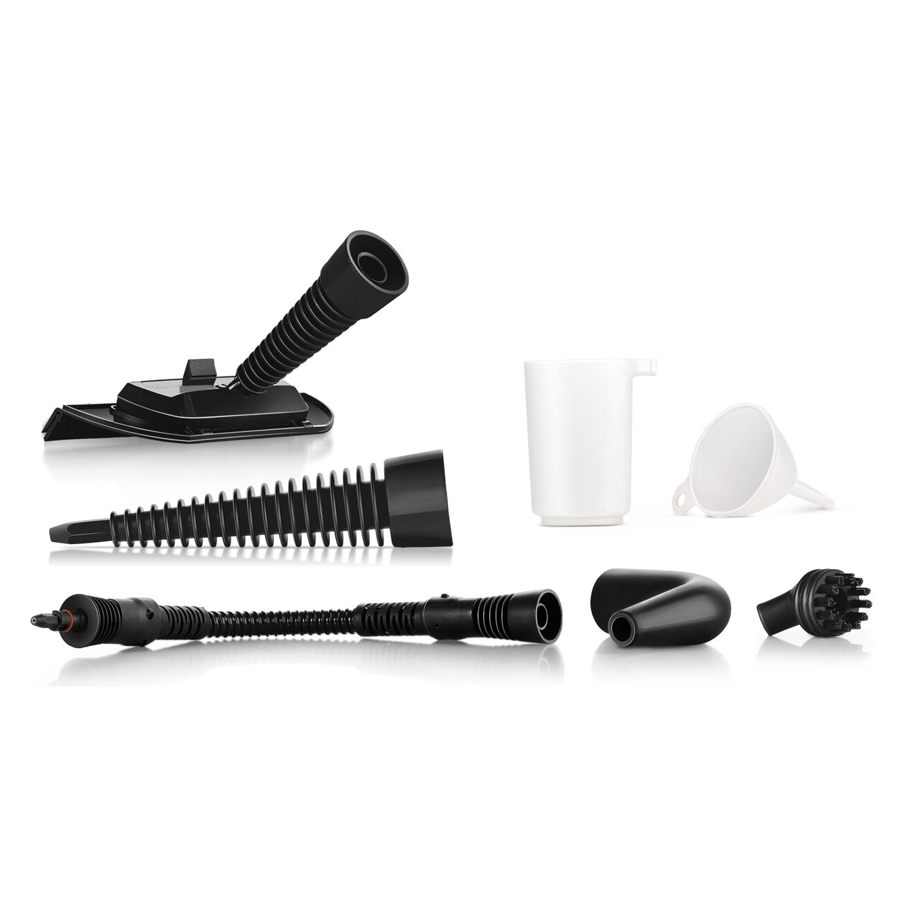 Zestaw akcesoriów do żelazka parowego na białym tle.