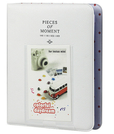 Biały album fotograficzny z napisem 'PIECES OF MOMENT', ze zdjęciem autobusu.