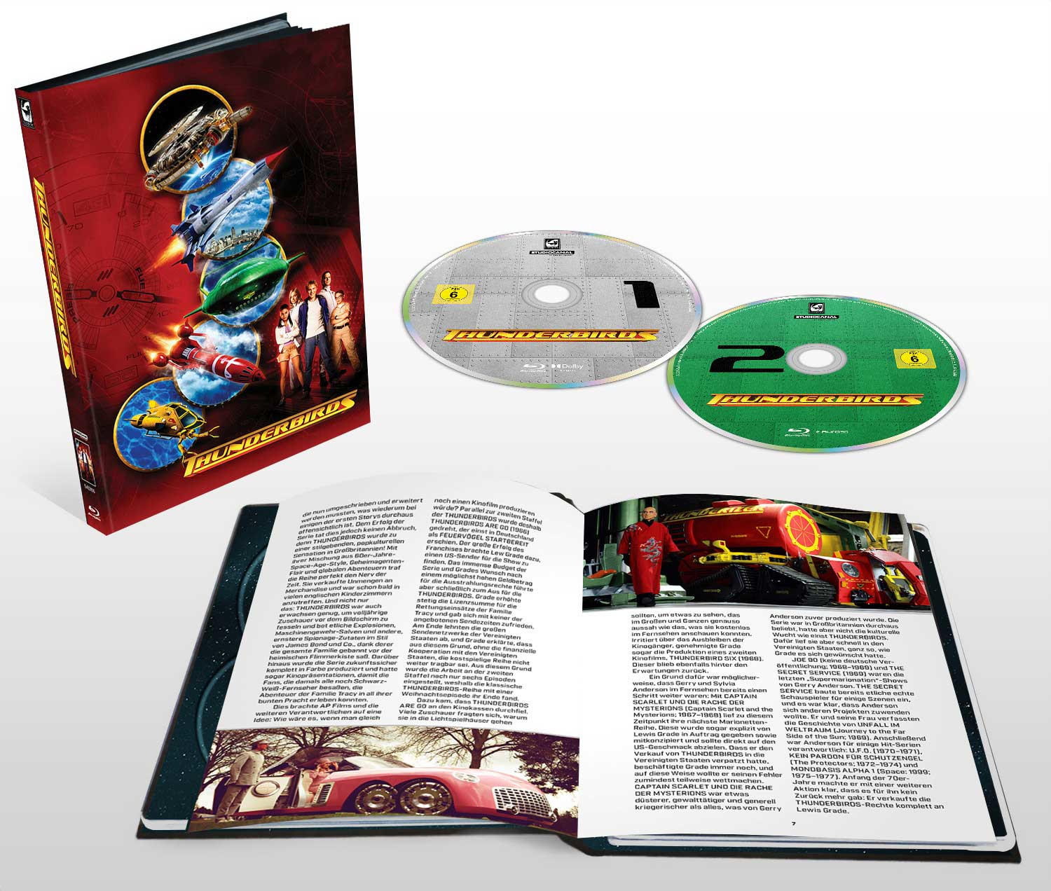 Thunderbirds Blu-ray-Boxset, geöffnet mit Discs und einem Buch mit Bildern und Text.