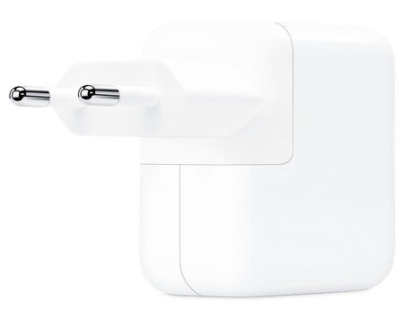 Biała ładowarka USB Apple z dwoma bolcami do gniazd europejskich.