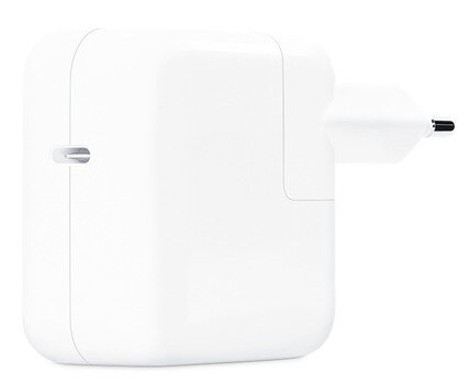 Biały zasilacz z wtyczką. Kwadratowy kształt z zaokrąglonymi krawędziami.