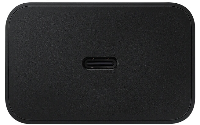 Czarna, prostokątna ładowarka Samsung. Ma pojedynczy port USB-C pośrodku urządzenia.