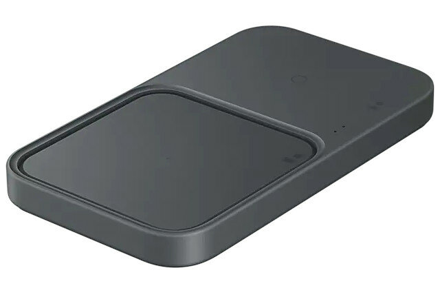 Czarna ładowarka bezprzewodowa. Prostokątny kształt, podkładka ładująca, ciemnoszary, elegancki.