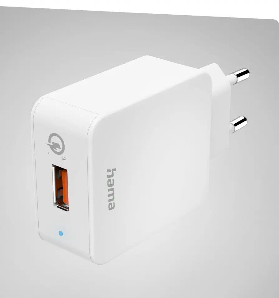 Biała ładowarka Hama z portem USB i niebieskim światłem. Produkt znajduje się na szarej powierzchni.