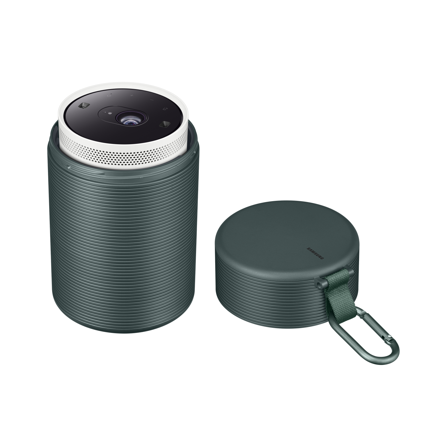 Groene cilindrische projector en een groene ronde hoes. Donkere achtergrond.