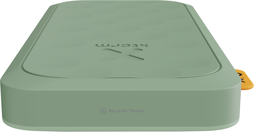 Green rectangular device with a textured surface, the logo, and a yellow tag.