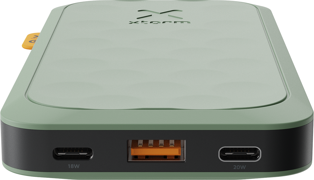 A green and black power bank with USB and USB-C ports.