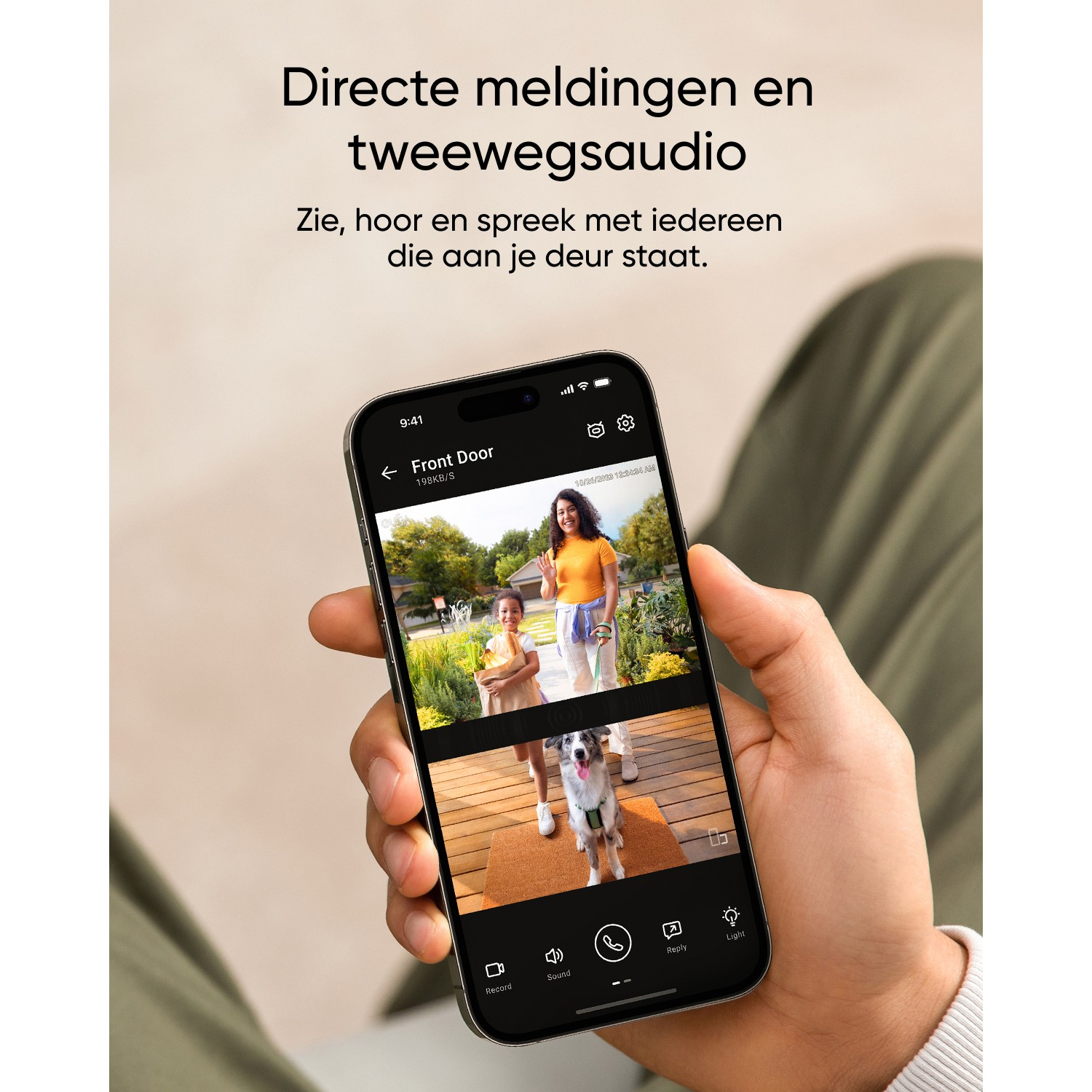 Person holding a phone showing a doorbell camera feed.