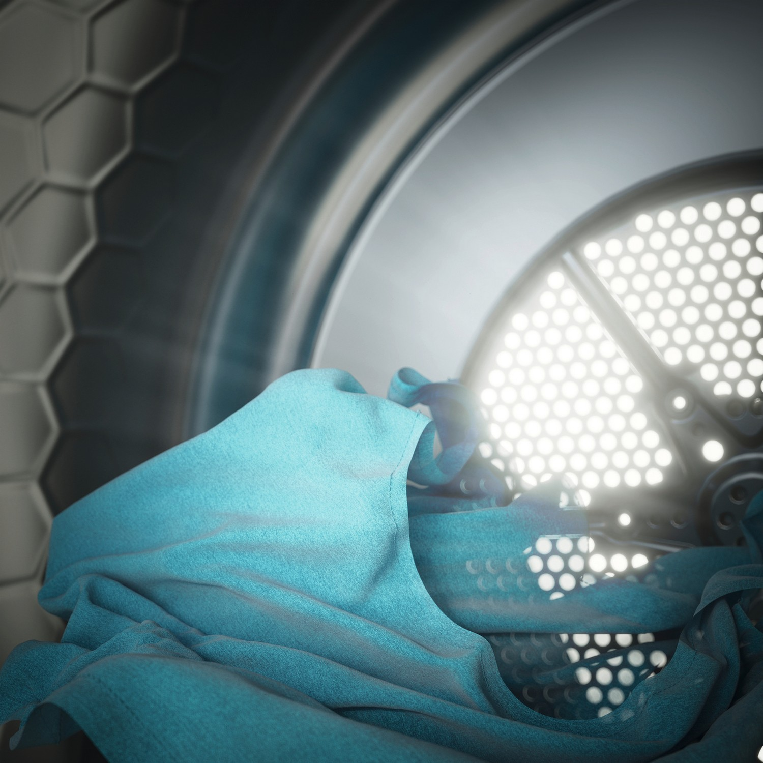 Close-up van kleding in een wasmachine.