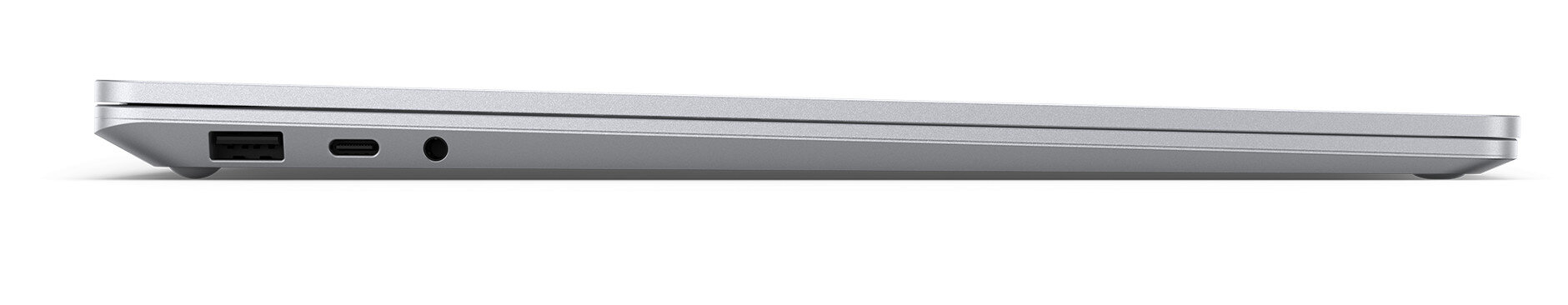 Widok z boku srebrnego laptopa z widocznymi portami.
