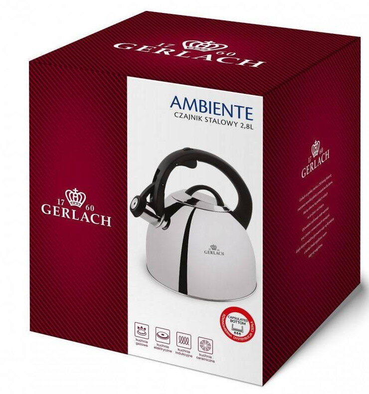 Czerwone pudełko z czajnikiem ze stali nierdzewnej. Czajnik ma czarny uchwyt i wylewkę. Pudełko ma tekst i logo.