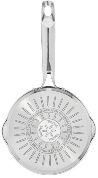 Spód patelni ze stali nierdzewnej z technologią Tefal Thermo-Fusion.