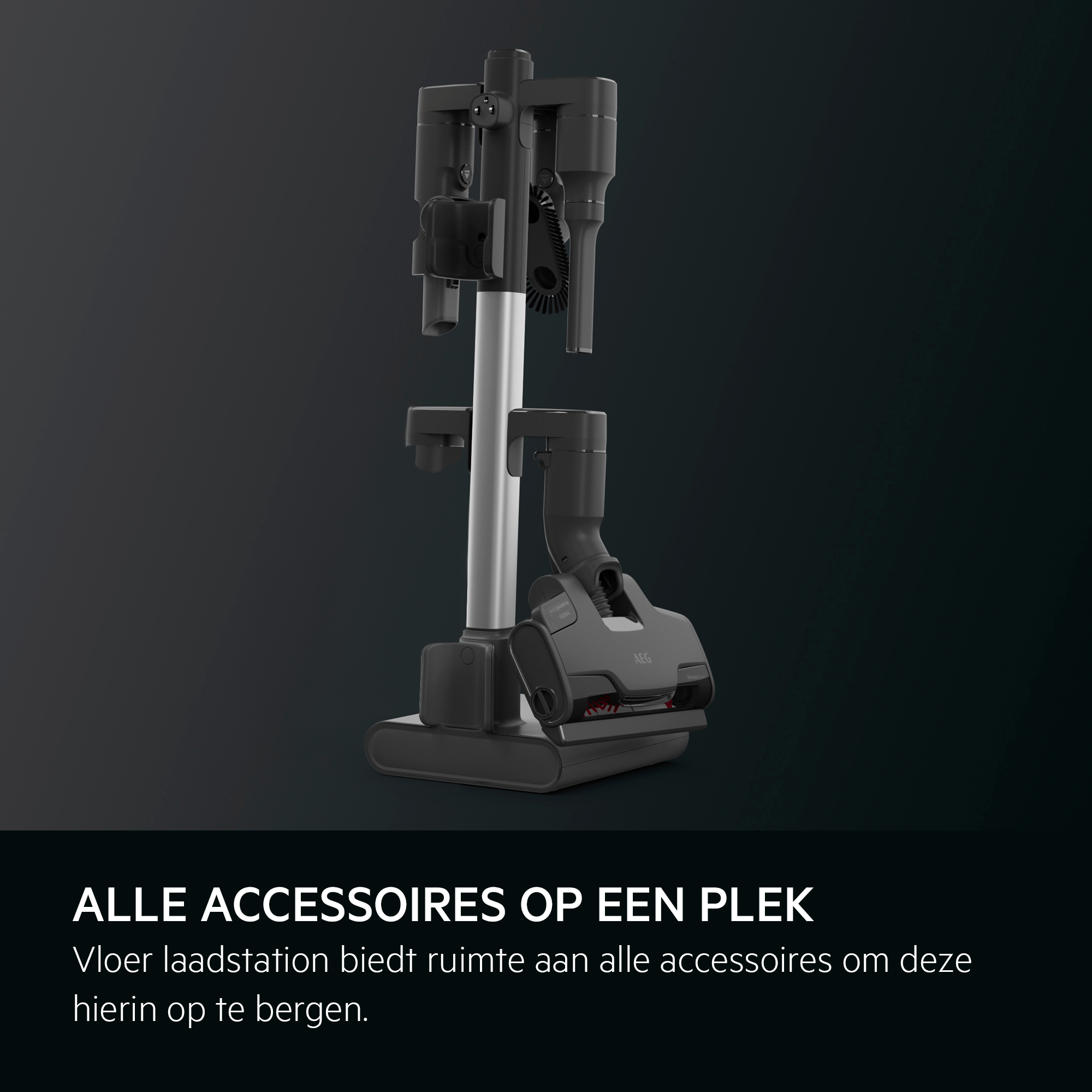 Vacuum cleaner charging station with accessories. Silver pole, black base, and attachments are visible.