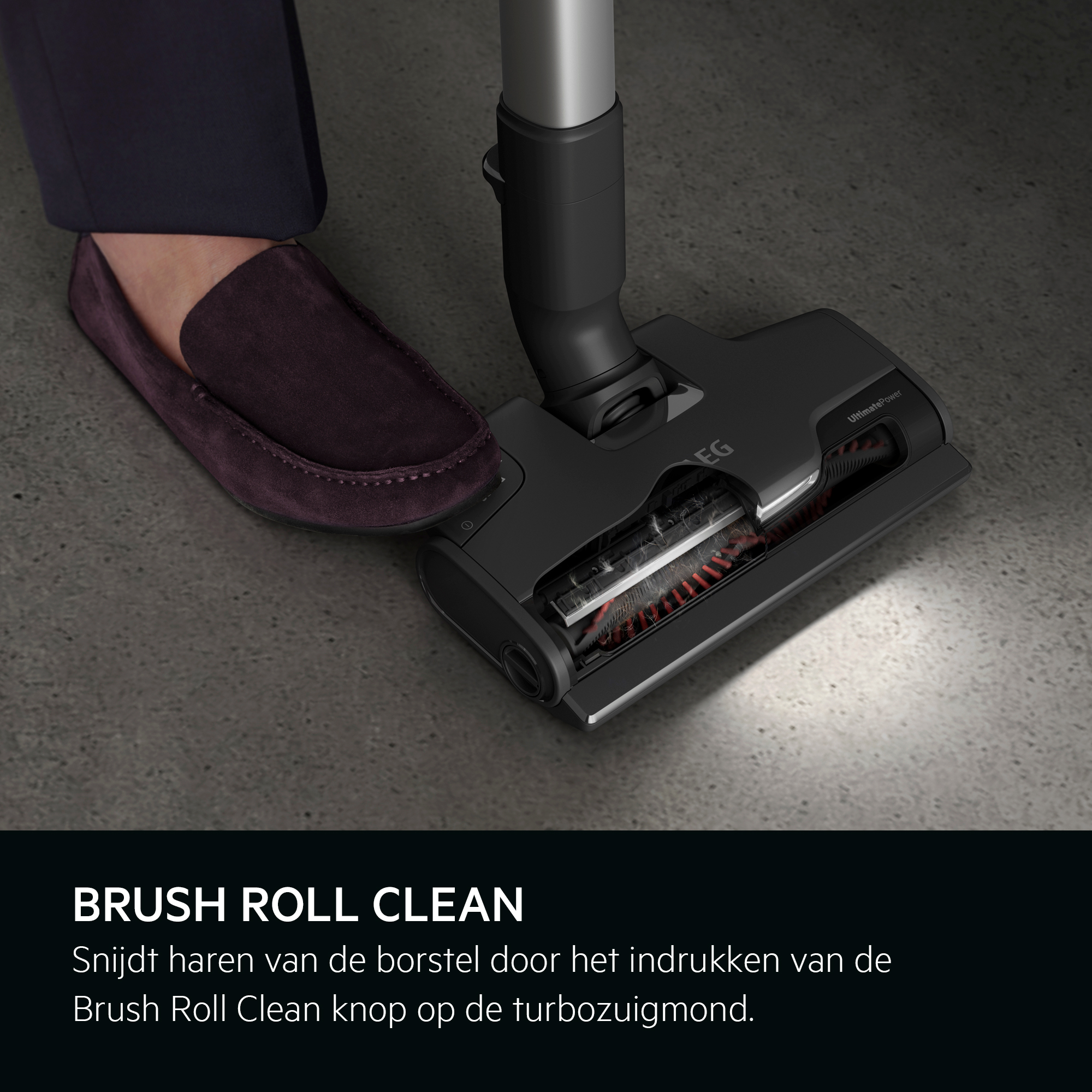 A vacuum cleaner head on the floor. Text at the bottom describes the 'Brush Roll Clean' function.