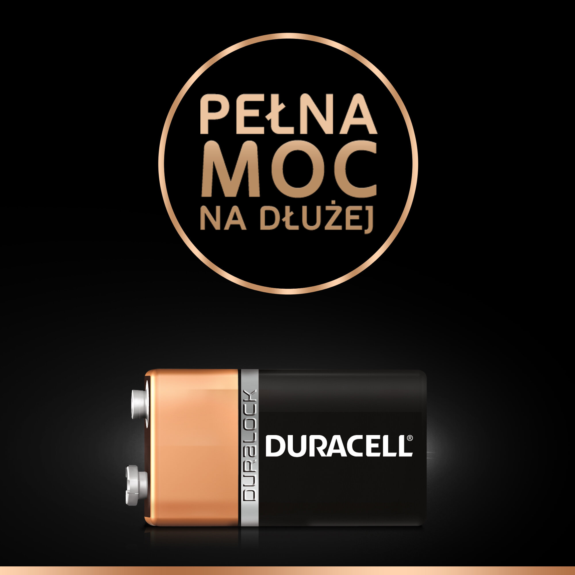 Bateria Duracell z czarnym korpusem i miedzianym wierzchem.