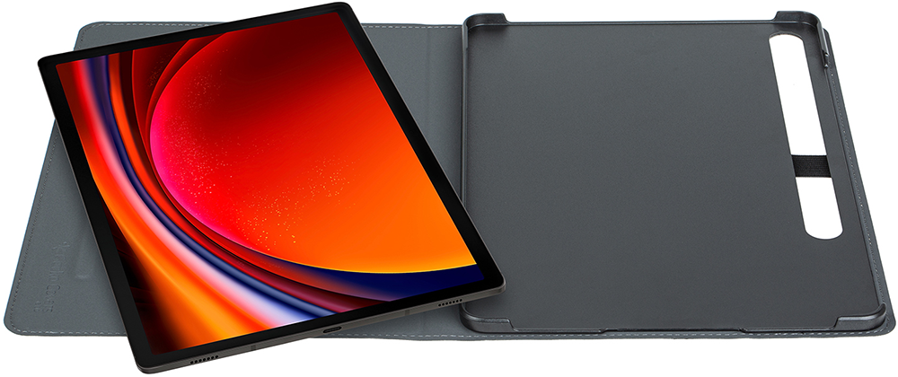 A tablet with a colorful screen, next to its gray case, on a white surface.