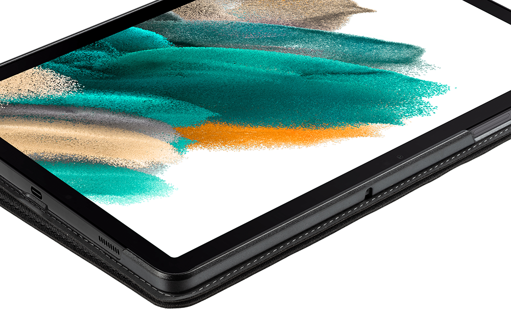 A tablet with a case. The screen displays a colorful abstract design. Close-up.