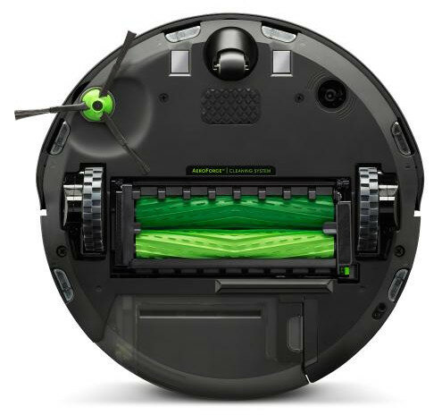 Czarny odkurzacz robot Roomba, widok od spodu, z zielonymi wałkami i szczotkami.