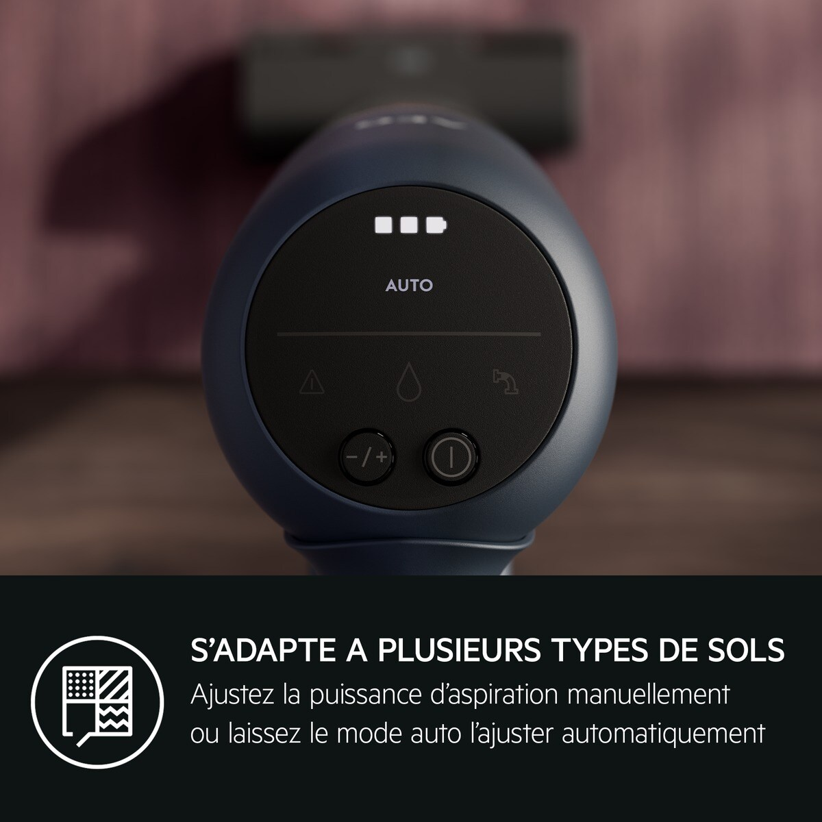 Un panneau de commande d'aspirateur bleu, noir, avec des boutons et des voyants.