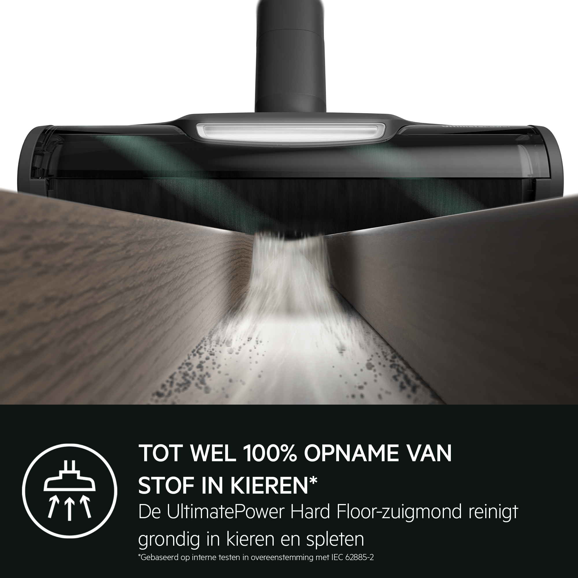 A vacuum cleaner head cleaning a wooden floor. Text: up to 100% dust pickup in gaps.