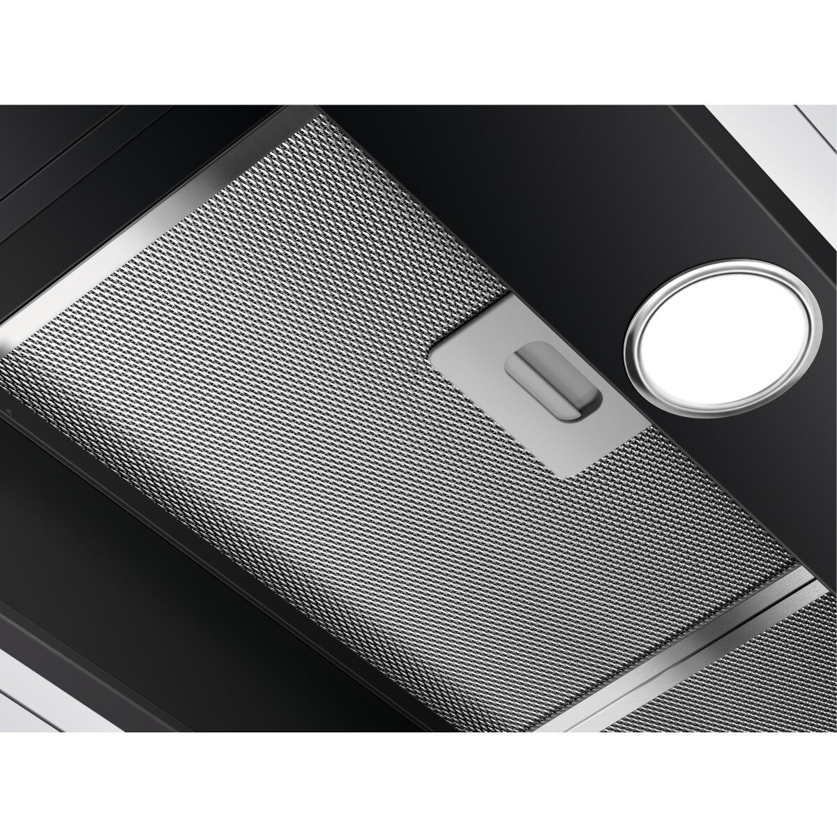 Zbliżenie filtra okapu, z metalową siatką.