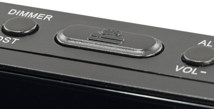 Czarno-szare radio z przyciskami i głośnikiem, z napisem PHILIPS, widok z góry.