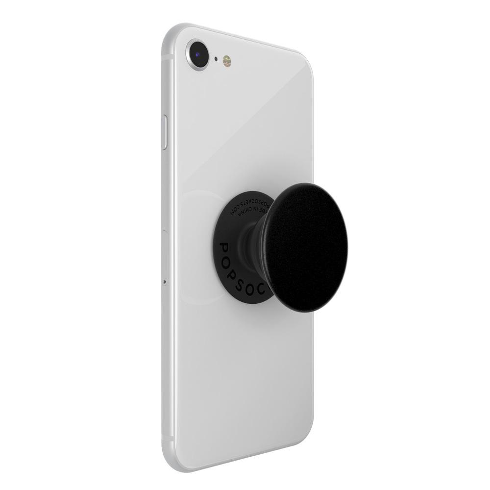 Weißes Telefon mit einem schwarzen PopSocket auf der Rückseite befestigt. PopSocket ist kreisförmig.