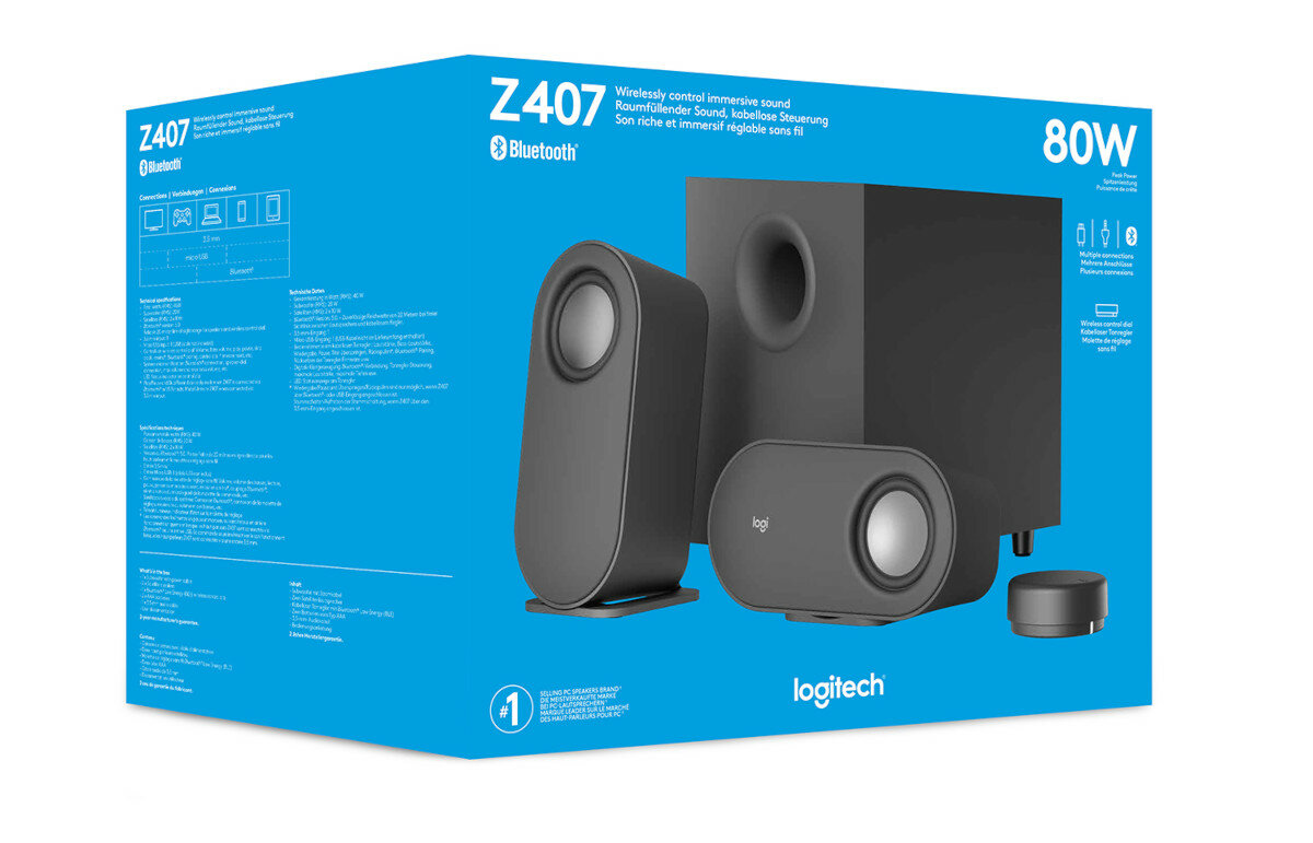 Niebieskie pudełko z czarnym systemem głośnikowym z dwoma małymi głośnikami, subwooferem i pilotem.