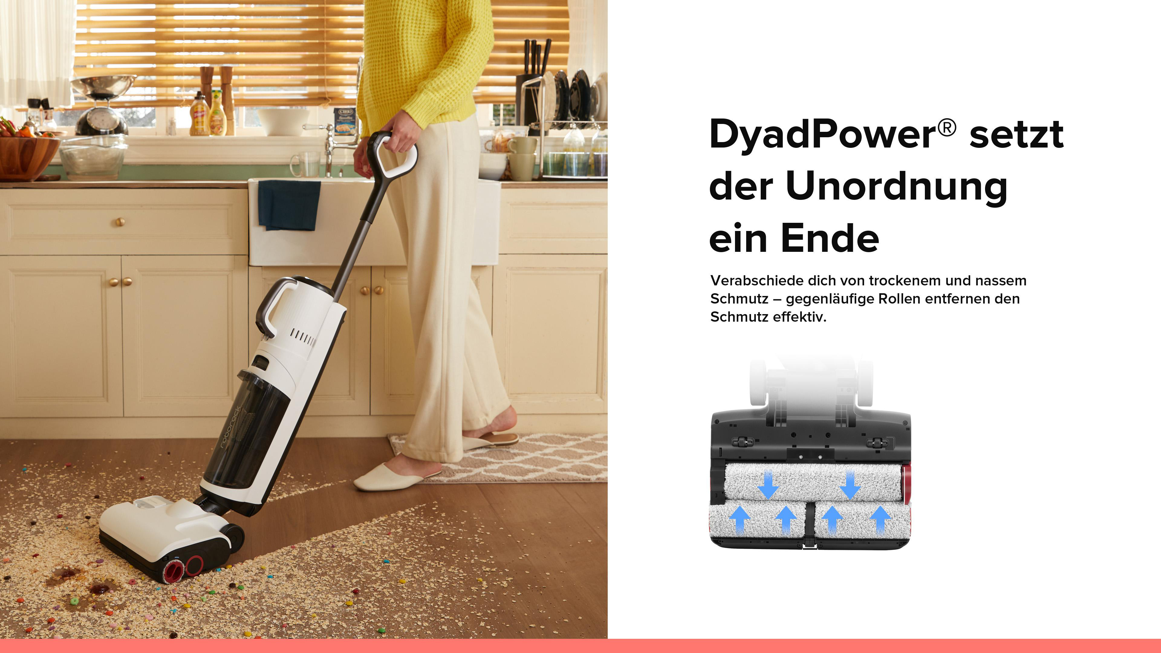 Person verwendet weißen/schwarzen Bodenreiniger auf einem Boden mit Schmutz.