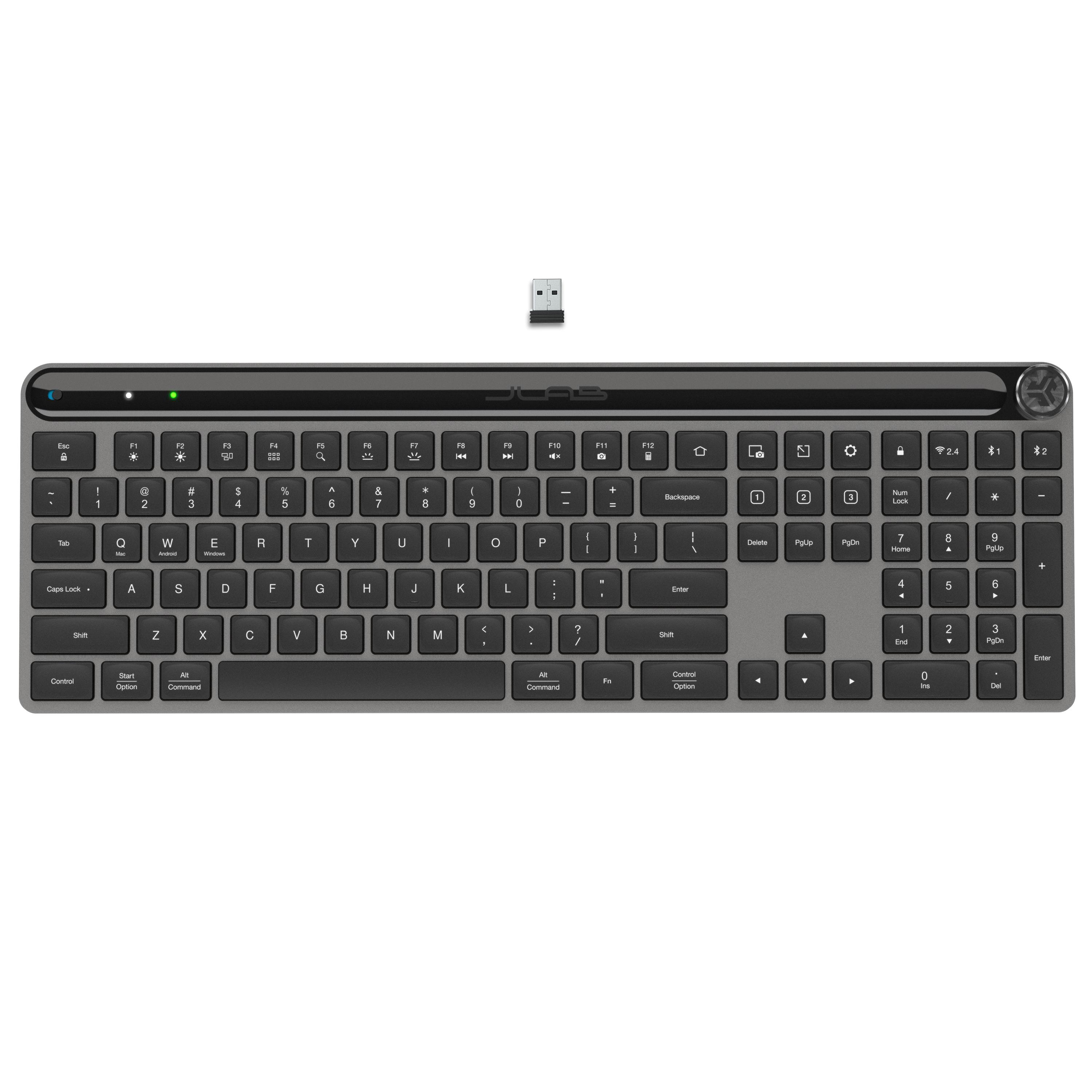 Graue Tastatur mit einem drahtlosen USB-Empfänger.