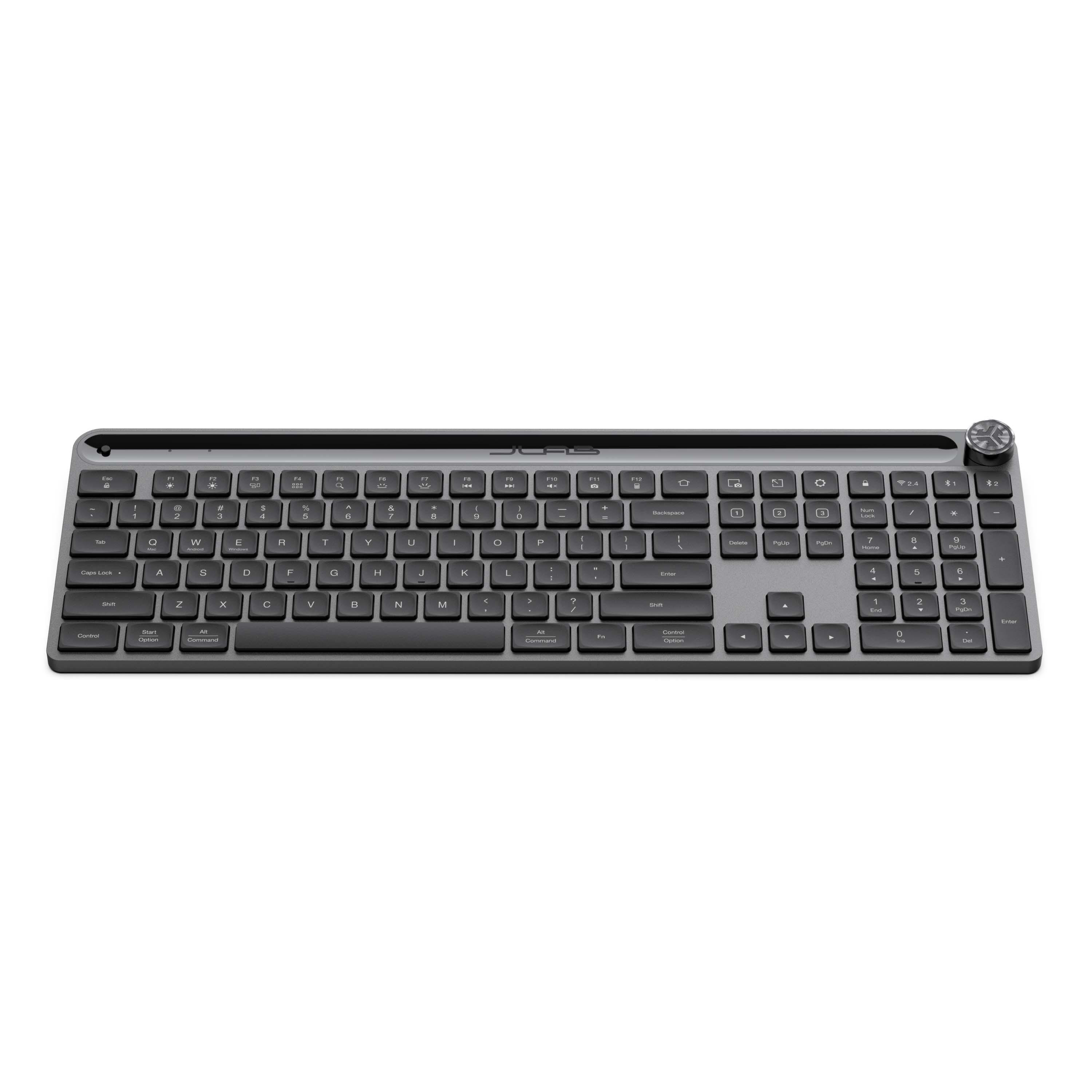 Eine graue Tastatur mit Drehregler und schwarzen Tasten. Die Tastatur ist rechteckig.