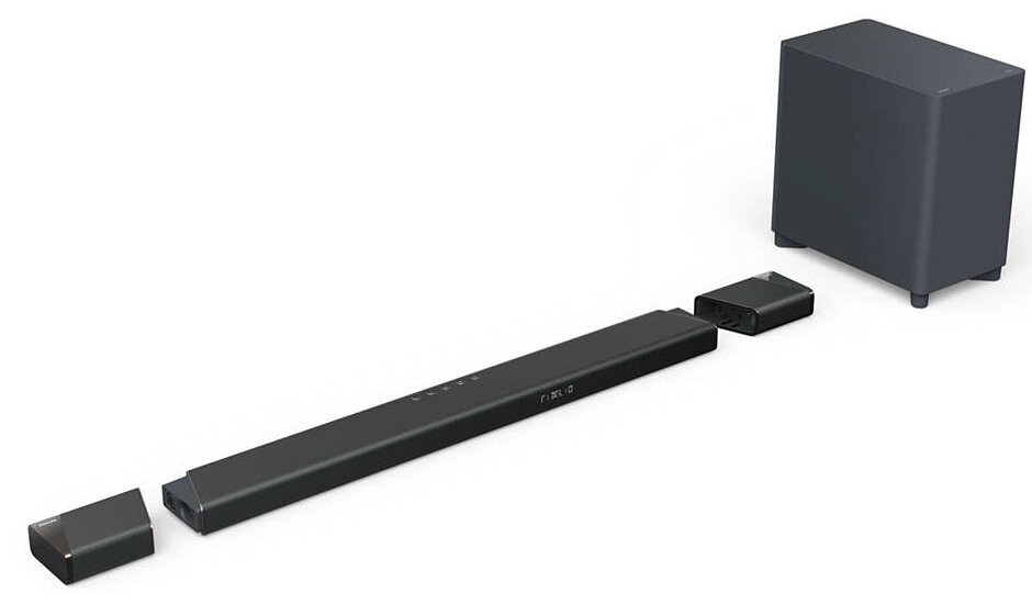 Czarne komponenty soundbaru, subwoofer i piloty. Białe tło.