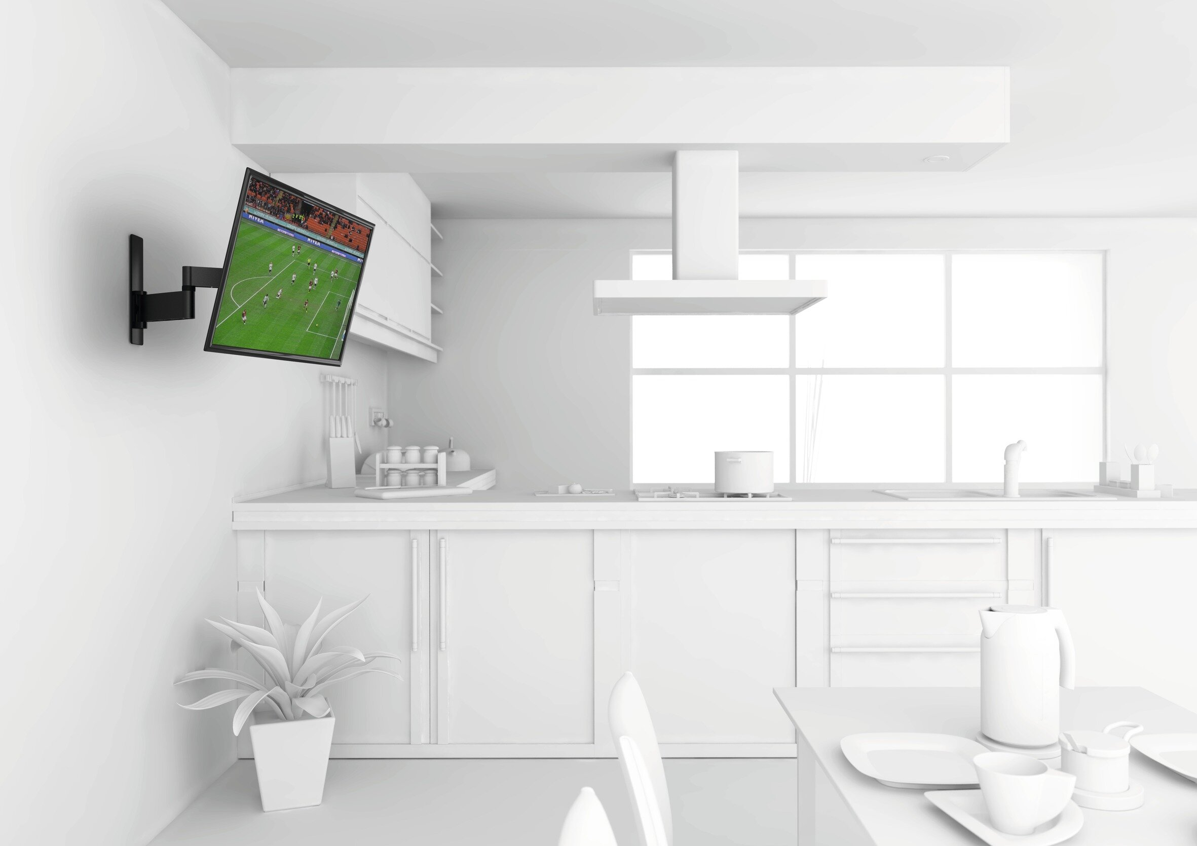 Kuchnia z telewizorem na ścianie, pokazującym mecz piłki nożnej.