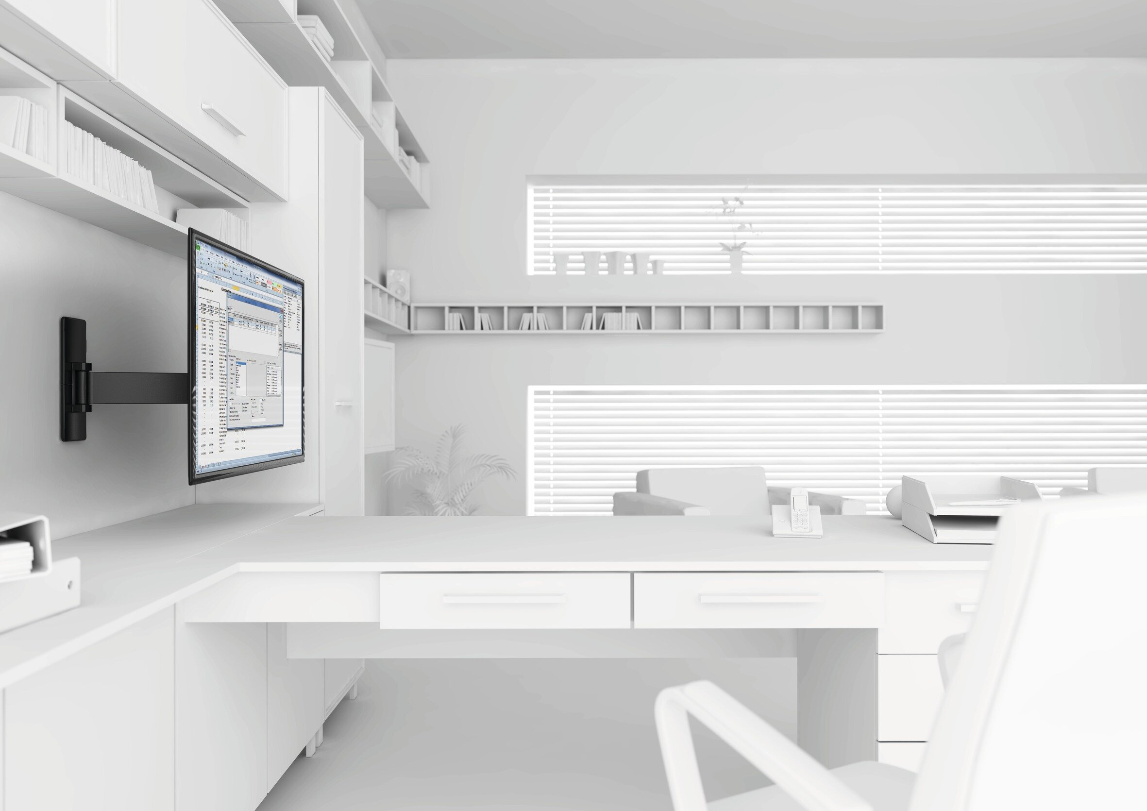 Białe biuro z monitorem na ścianie. Obecne są biurko, krzesło i różne materiały biurowe.