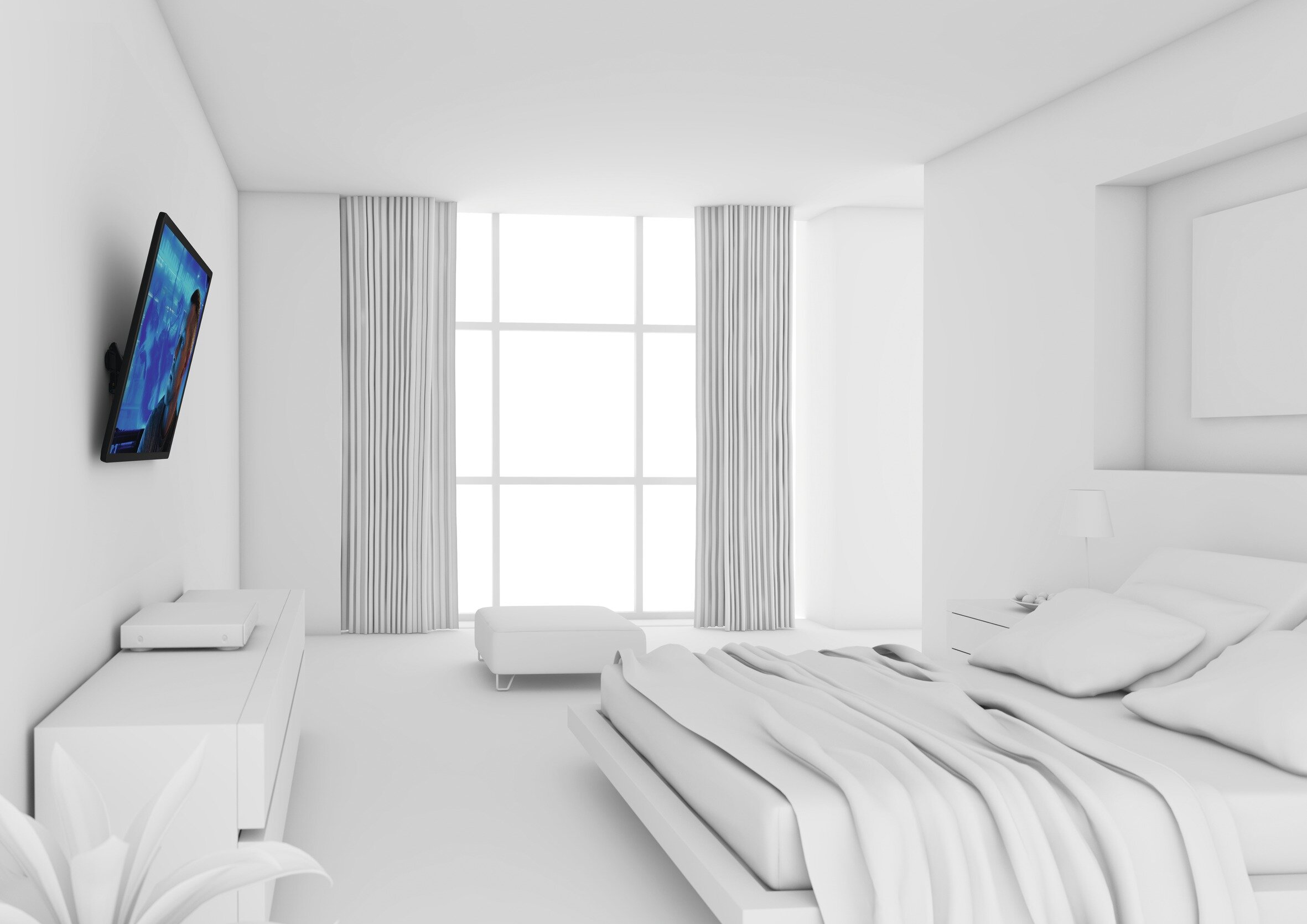 Biała sypialnia z telewizorem na ścianie i łóżkiem.