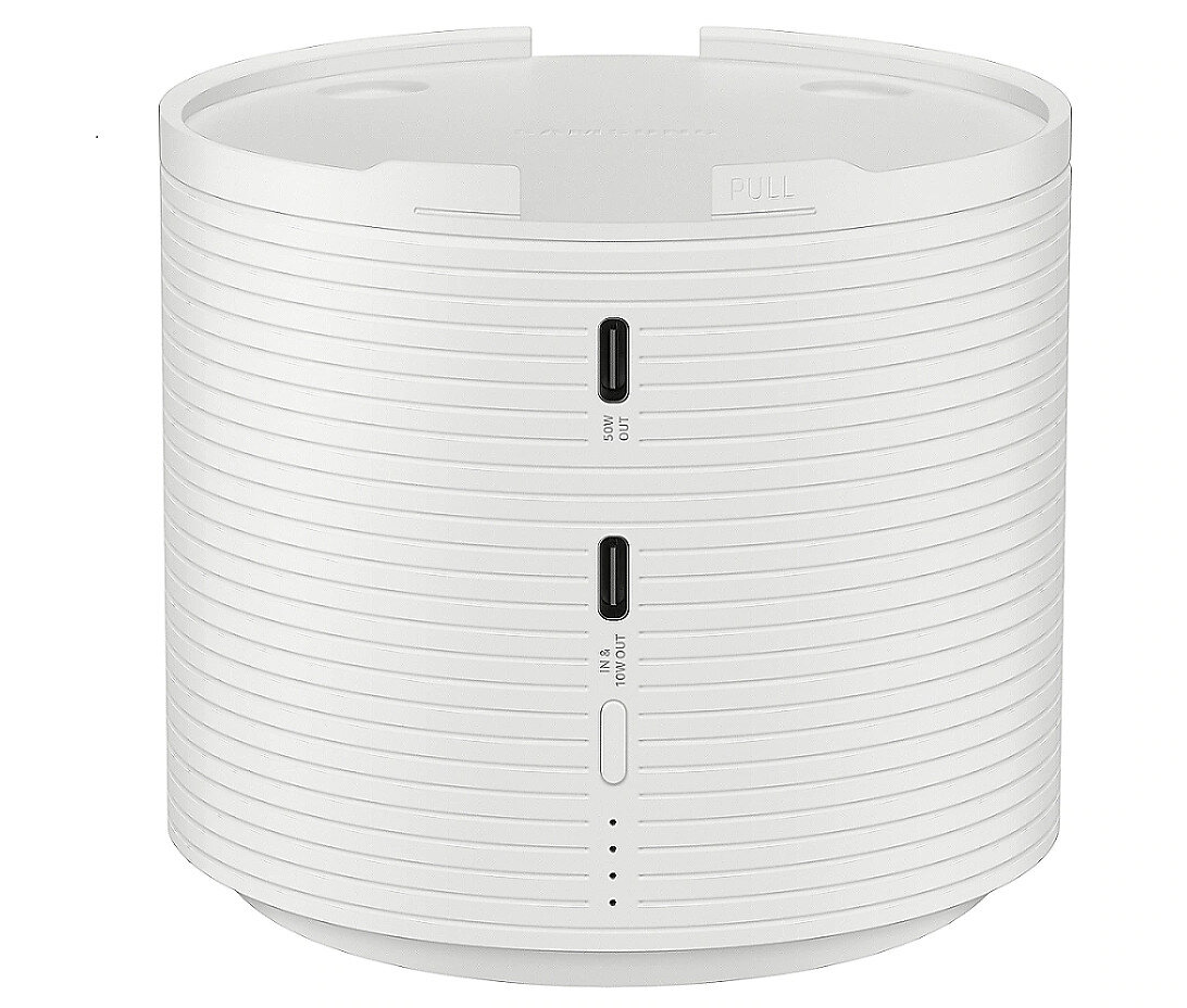 Białe cylindryczne urządzenie z portami.