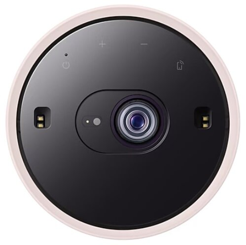 Widok z góry na mały, czarny projektor z obiektywem i przyciskami sterowania.