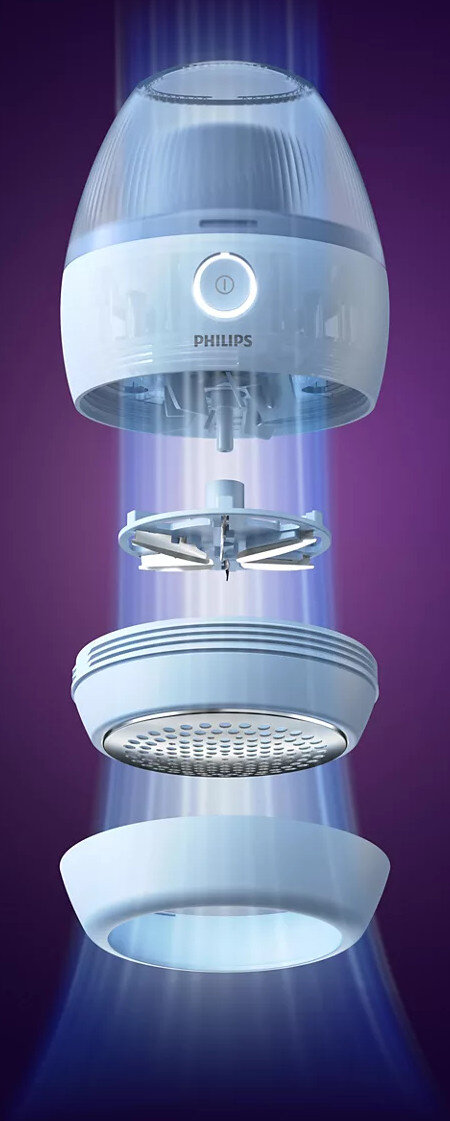 Widok rozstrzelony urządzenia do depilacji Philips, pokazujący jego elementy i strukturę wewnętrzną.