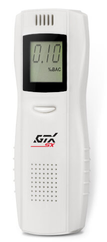 Biały alkomat z cyfrowym wyświetlaczem pokazującym 0,10% BAC i logo GTX SX.