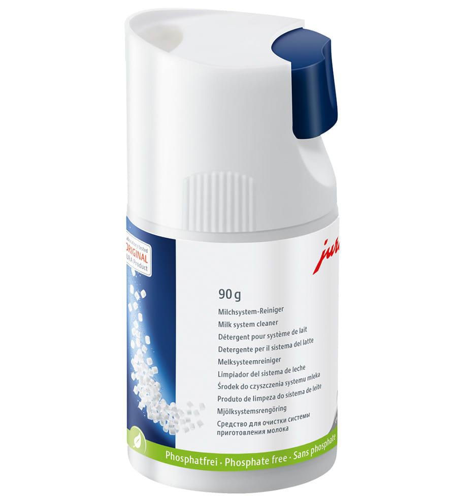 Weiße und blaue Reinigungsflasche. Text: Milchsystemreiniger. Phosphatfrei.