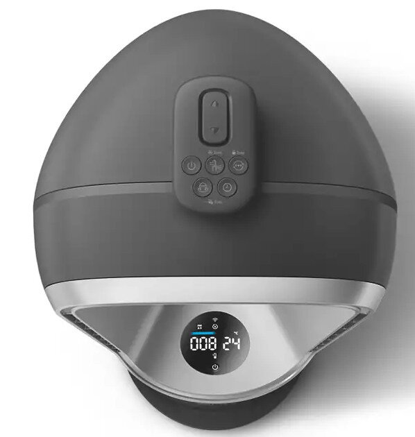 Widok z góry na ciemnoszary masażer do stóp z wyświetlaczem cyfrowym i przyciskami.