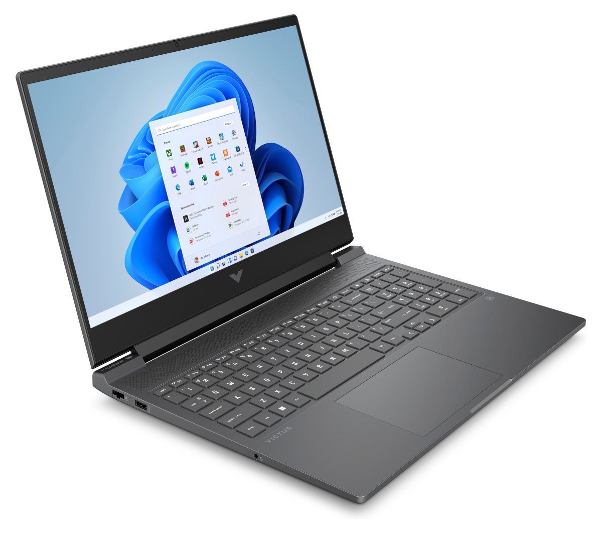 Ciemnoszary laptop, otwarty z wyświetlaczem Windows 11. Widok z prawej strony.