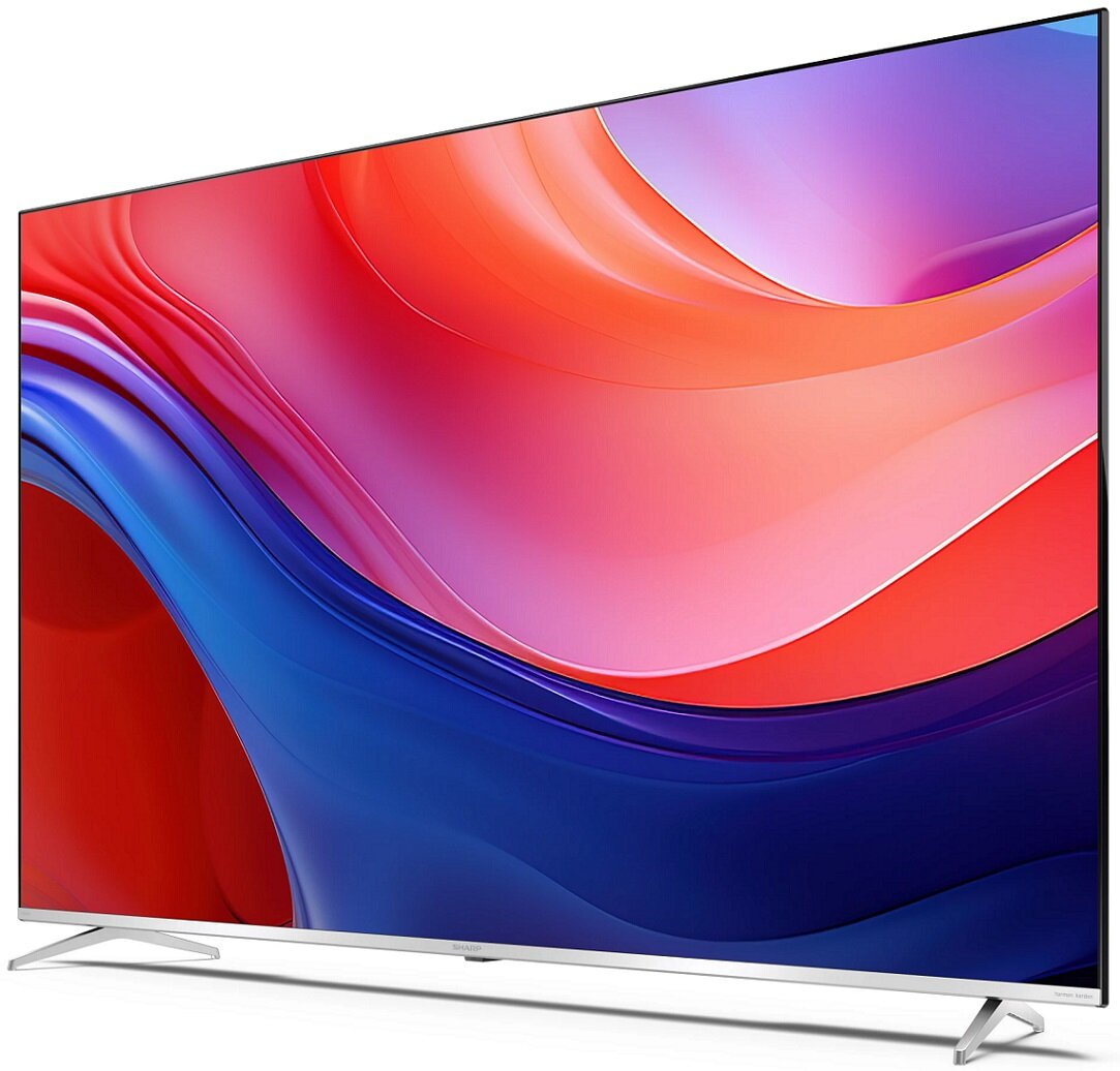 Duży telewizor z płaskim ekranem z kolorowym, abstrakcyjnym wyświetlaczem.
