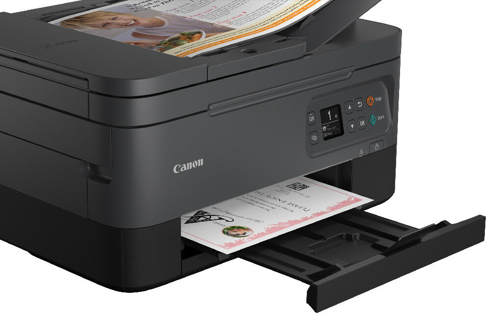 Czarna drukarka Canon drukująca papier. Ma wyświetlacz i przyciski. Papier wychodzi.