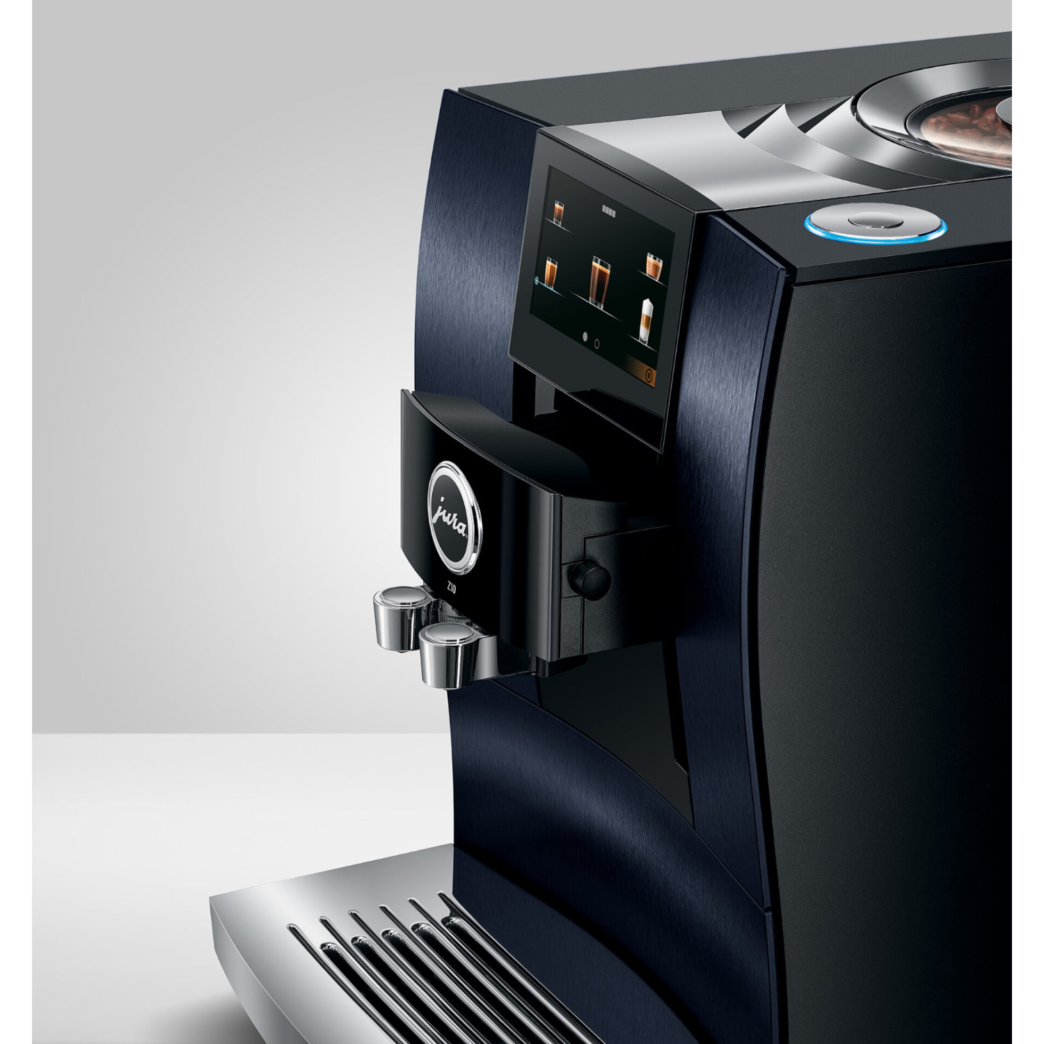 A black and blue Jura coffee machine with a touchscreen display and silver accents.