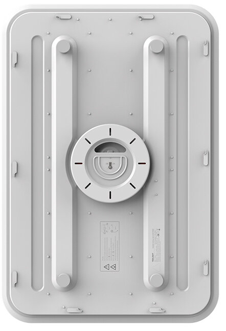 Tył białego prostokątnego urządzenia z podniesionymi elementami i okrągłym środkiem.