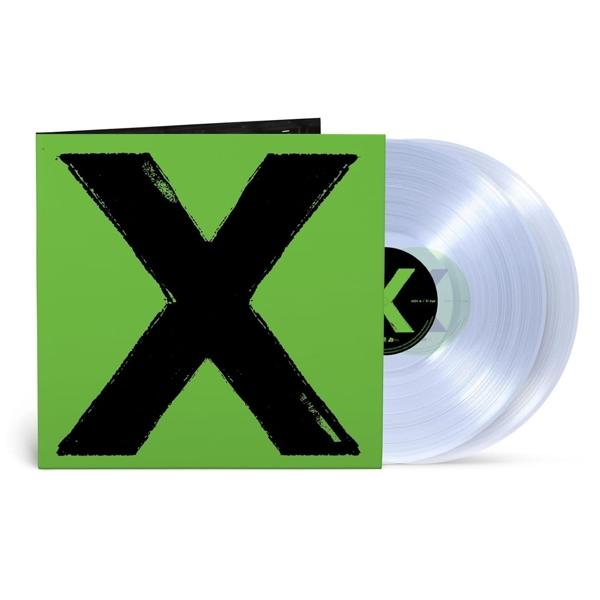 Un album vinyle avec une couverture verte et un grand X noir. Les disques sont transparents.