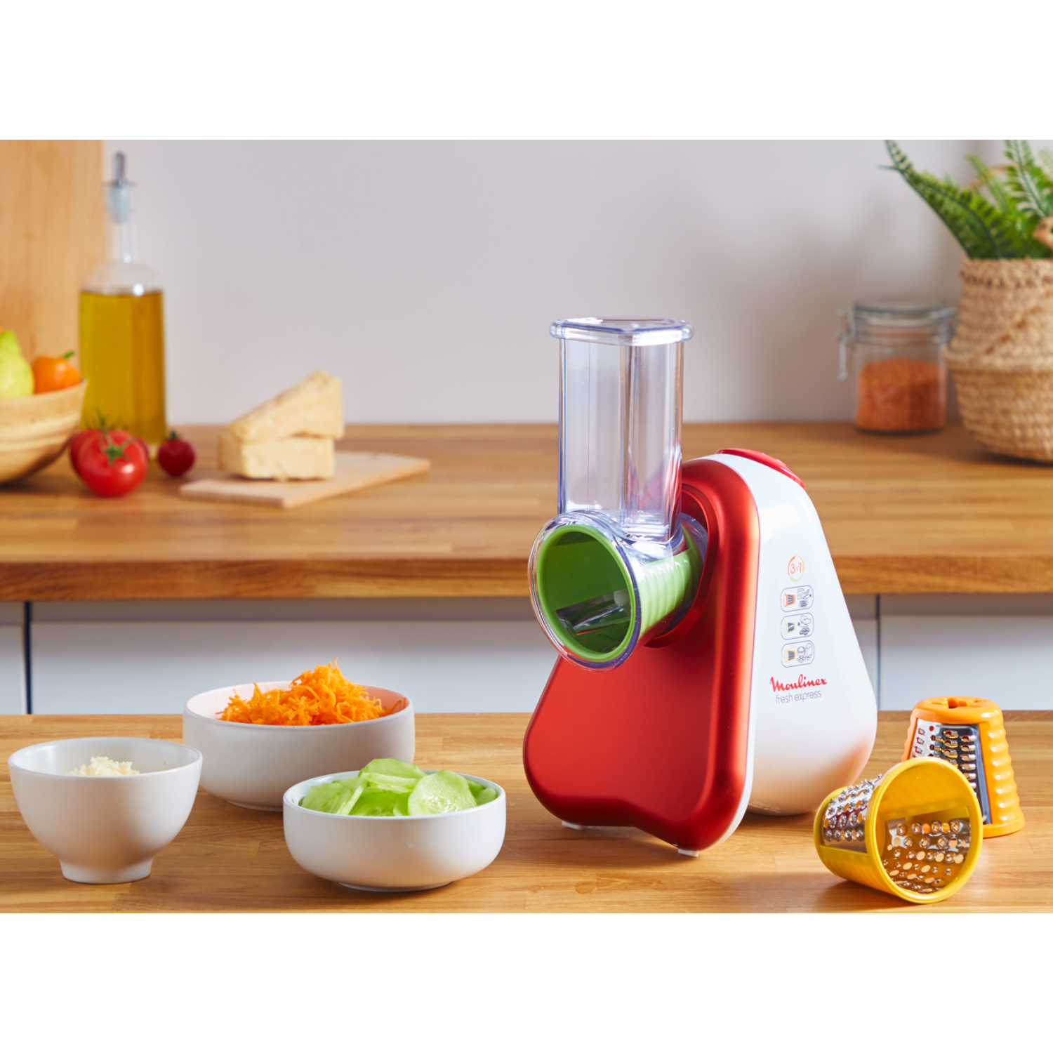 Food processor with red and white body, various components, and bowls.
