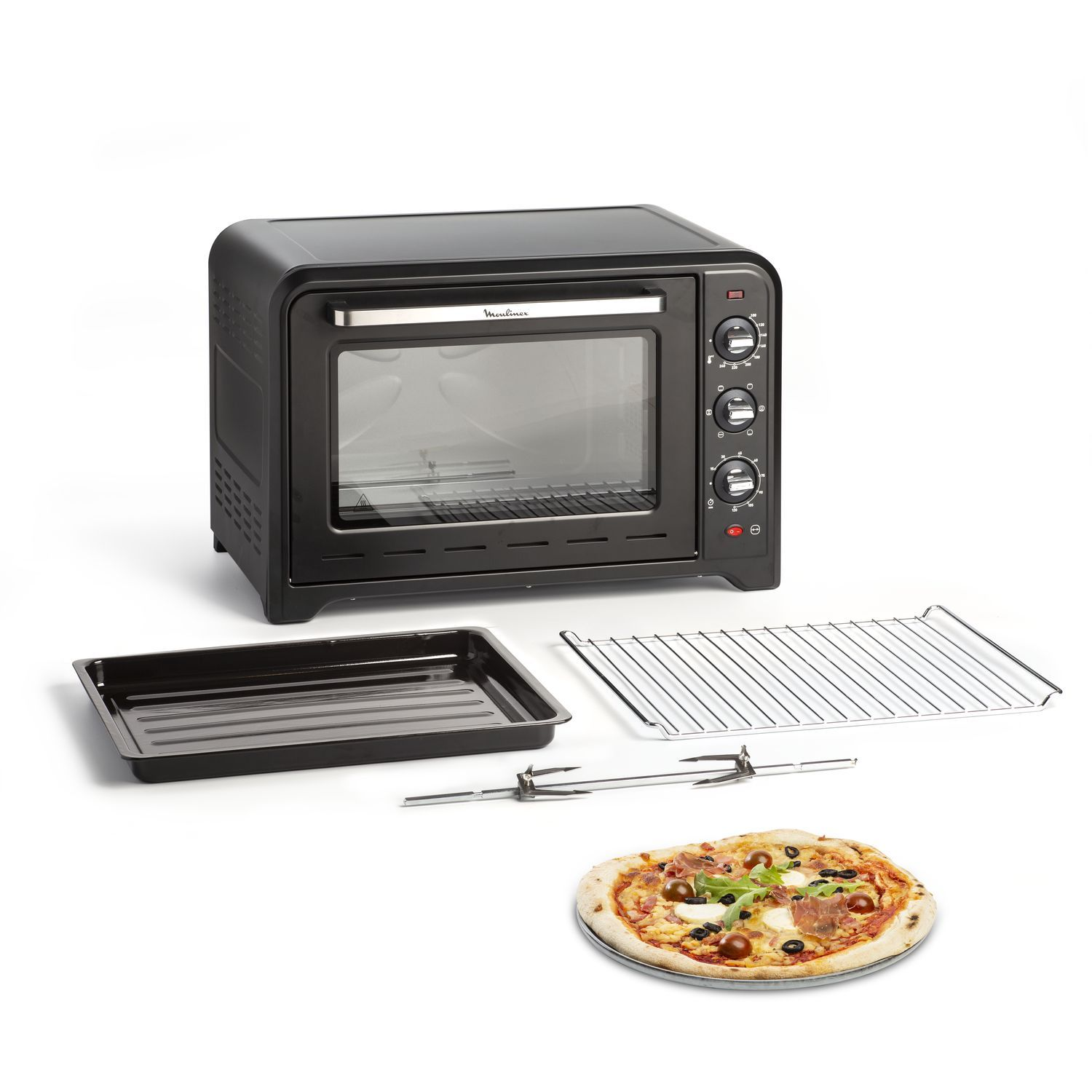 A black oven with accessories like a tray, grill, and pizza, on a white surface.